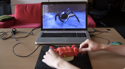 This crab-shaped controller will make you hungry for more anthropomorphic handsets