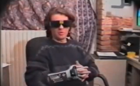 Watch a guy in a Power Glove demo the terrible virtual reality of the 90s