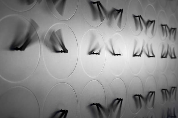 Watch this beautiful installation turn a digital clock into an analog one